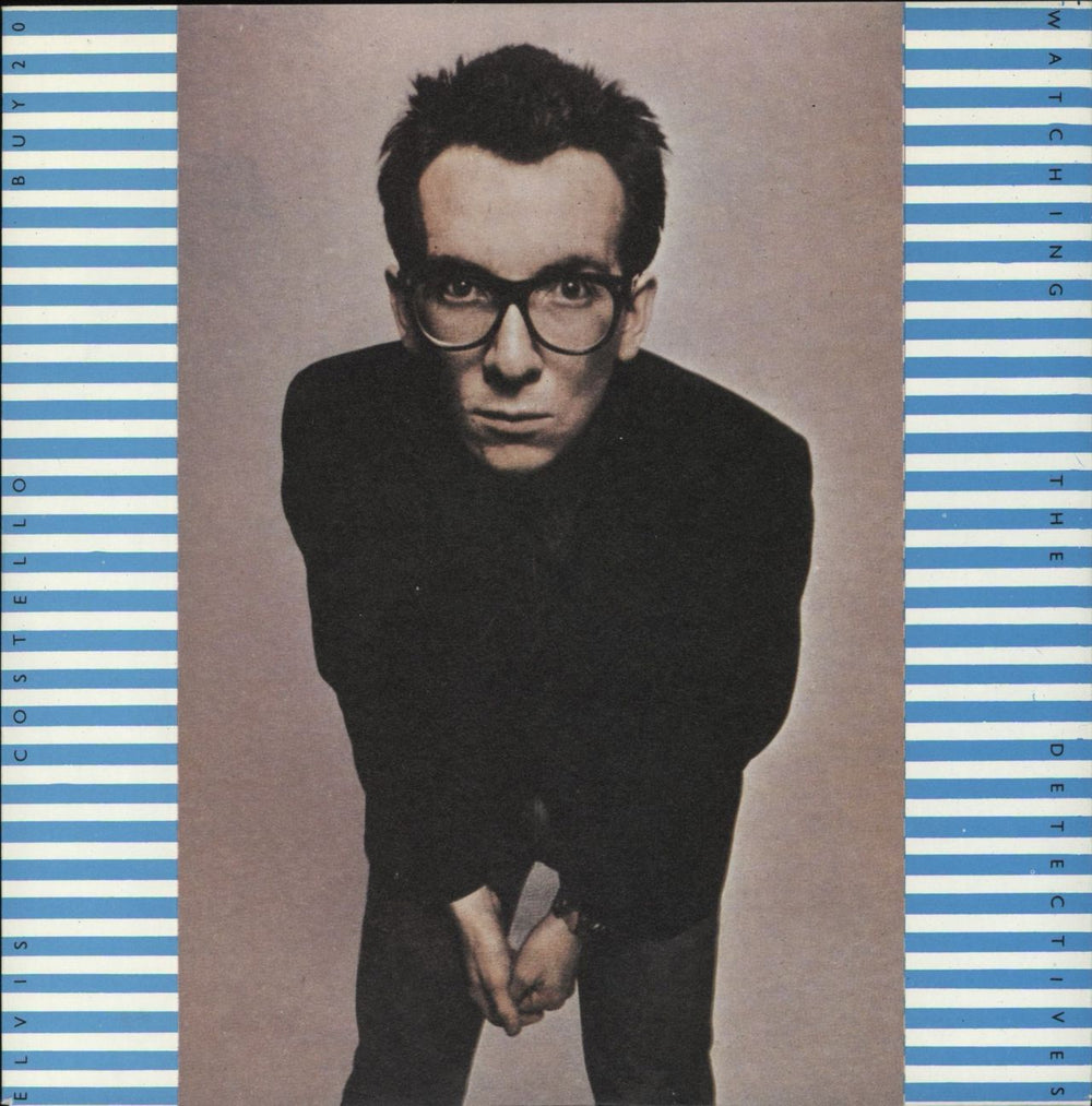 Elvis Costello Watching The Detectives - Solid + p/s UK 7" vinyl single (7 inch record / 45) BUY20