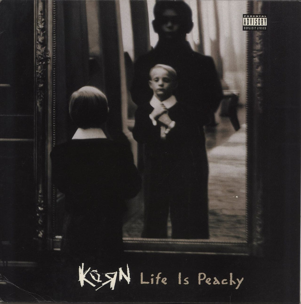 Korn Life Is Peachy - EX UK vinyl LP album (LP record) EPC485369-1