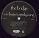 Neil Young The Bridge - A Tribute To Neil Young - EX - stickered p/s UK vinyl LP album (LP record) YOULPTH816686