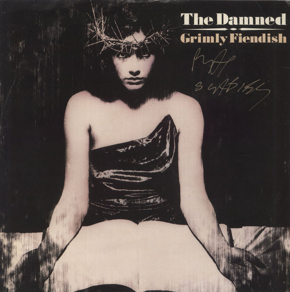 The Damned Grimly Fiendish - Autographed by Rat Scabies UK 12" vinyl single (12 inch record / Maxi-single) GRIMT1
